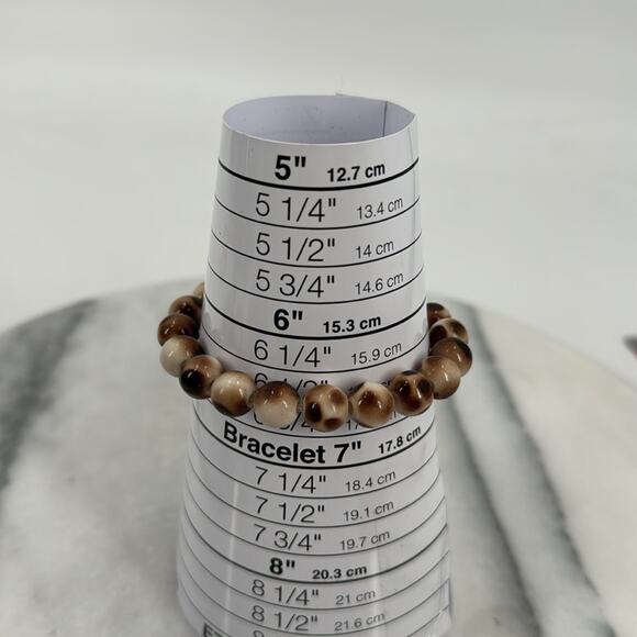 Brown and white beaded stretchy bracelet - Picture 2 of 2